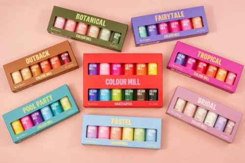 Assorted Colour Mill Food Colouring packs featuring coordinated Oil Blend and Aqua Blend colours for cake decorating