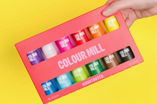 Colour Mill Kickstarter Pack containing twelve 20ml bottles of oil-based food colouring in assorted essential shades